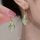 Trend Luxury Temperament Designer Angel Eyes Cat Eye Stone Women Girls Earrings Jewelry Gift Accessories Titanium Steel Material