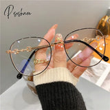 Vintage New Oval Metal Frame Glasses Women Fashion Optical Myopia Blocking Eyewear Popular Reading